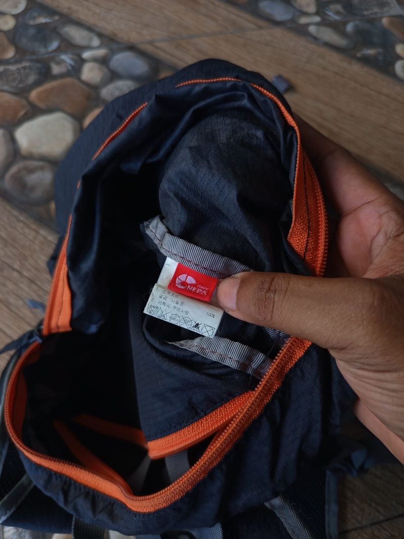 NEPA branded foldable pouch (packable bag) in black with ora, foto 6