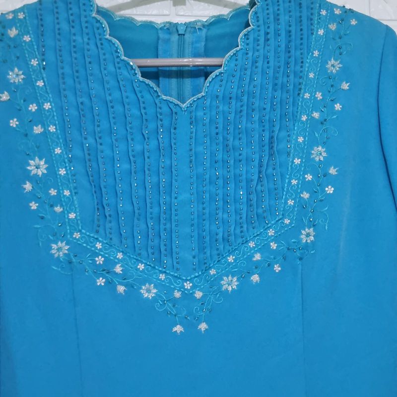 Tunik Biru Muda, foto 3