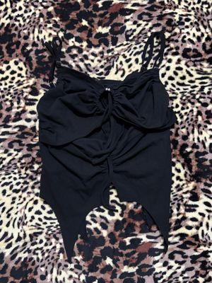 asymetrical cut out black tank