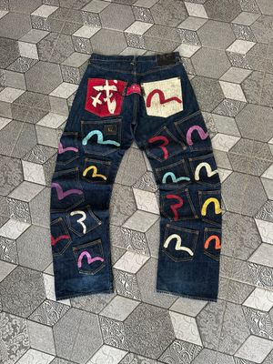 EVISU MULTI POCKET TRAVIS SCOTT DENIM SELVEDGE JEANS