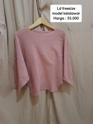 Atasan kalong wanita