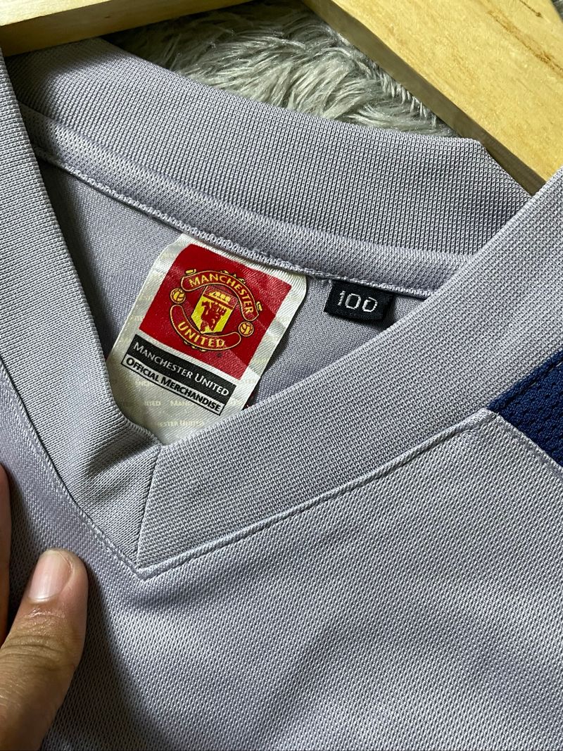 kaos MU, foto 4