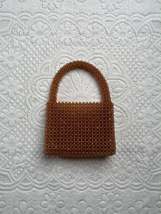 brown woven mini handbag
