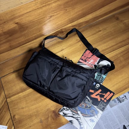 Uniqlo multi pocket sling bag
