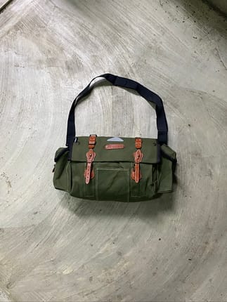 Hard canvas messenger bag