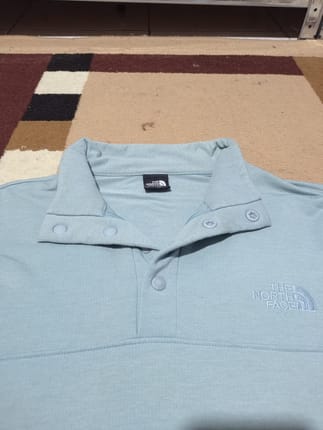 The North Face TKA Glacier atau seri half-zip/snap-neck TNF