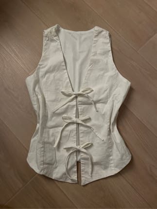 white coquette vest