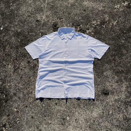 Kemeja Polo Uniqlo