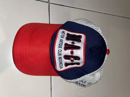 topi maci