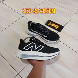 New Balance Sportswear Sneakers Pria white black