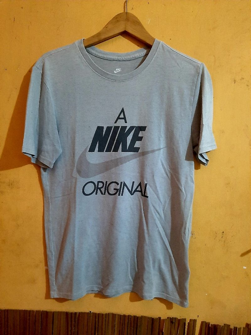 baju nike original