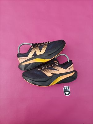 New Balance Sc Elite v4 Black Orange