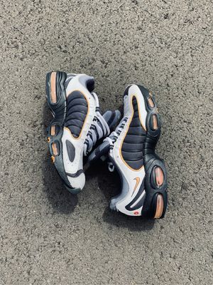 NIKE TAILWIND 4