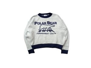 With oversized knit sweater