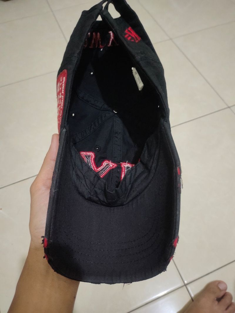 Topi hitam, foto 4