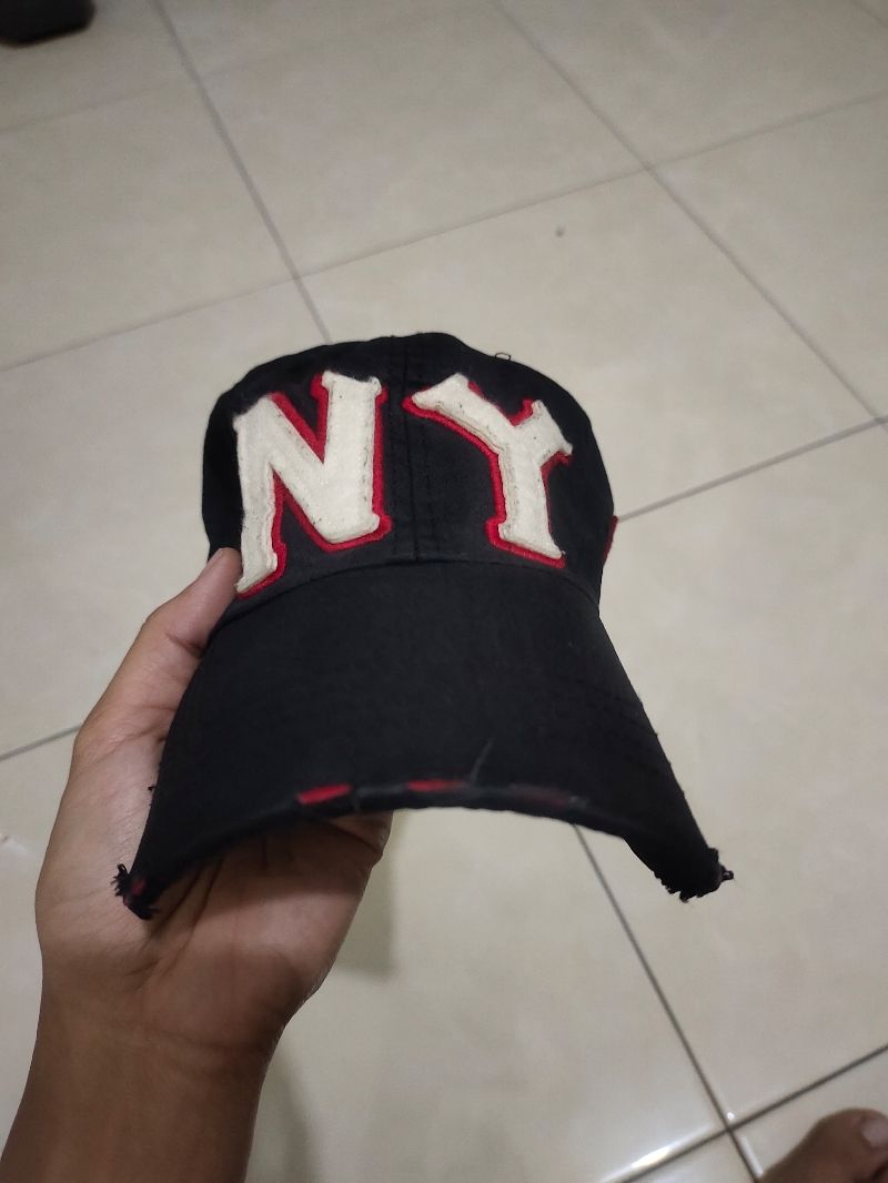 Topi hitam, foto 5
