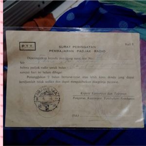 Pajangan SURAT PERINGATAN PEMBAJARAN PADJAK RADIO