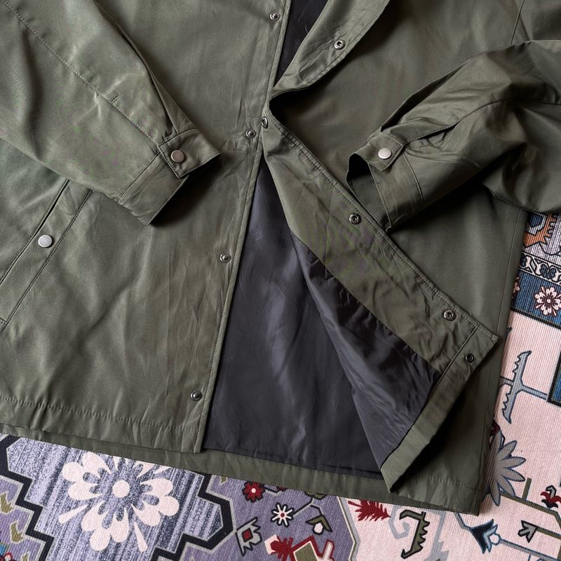 GU Minimalist Windbreaker Pria green, foto 3