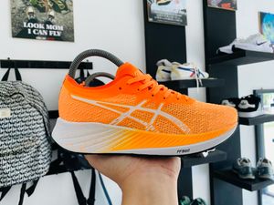asics magic speed orange running