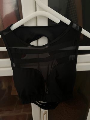 Baju olaraga warna hitam