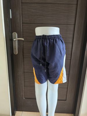 dua celana olahraga anak biru tua kuning pl