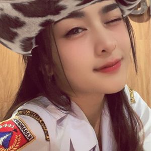 Komang Ayu Masgini